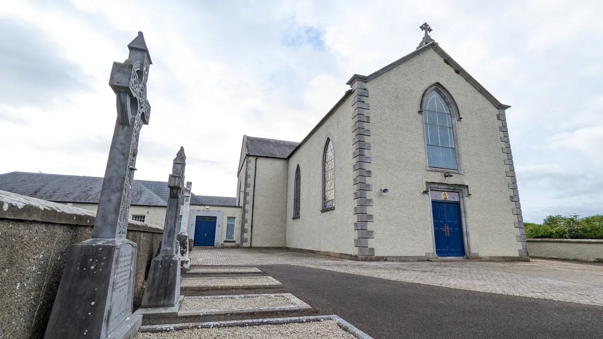 St. Patrick’s Church, Stamullen, with Celtic cross headstones in the foreground